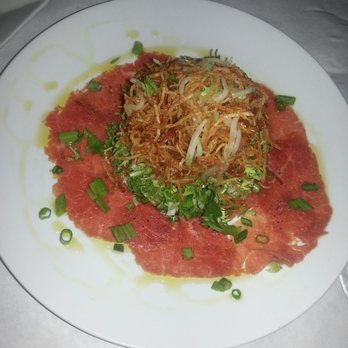 Pamplona Tapas Bar - Beef Carpaccio salad. - Spanish Near Me - Lafayette, Louisiana Pamplona Tapas Bar - Beef Carpaccio salad. - Spanish Near Me - Lafayette, Louisiana