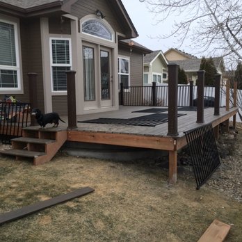 Schwabees Landscaping and Construction - a dog on a deck - Landscaping Near Me - Longmont, Colorado
