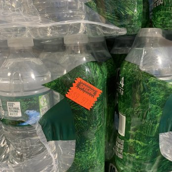 Palm Tree Marketplace - a display of palm trees wrapped in plastic - International Grocery Near Me - Bronx, New York Palm Tree Marketplace - a display of palm trees wrapped in plastic - International Grocery Near Me - Bronx, New York