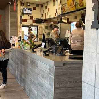 Burger King - customers ordering food at the counter - Burgers Near Me - Albion, New York Burger King - customers ordering food at the counter - Burgers Near Me - Albion, New York