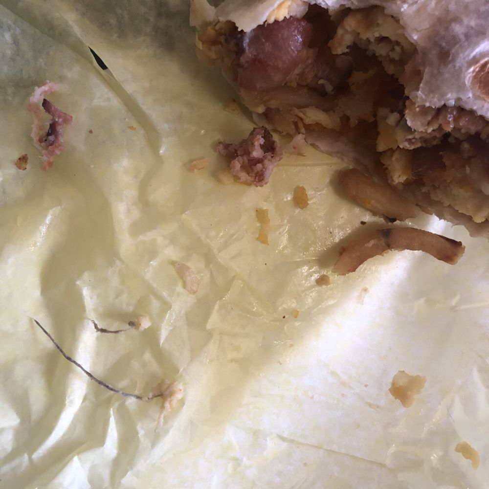 Piece of a dirty mop in the breakfast burrito Piece of a dirty mop in the breakfast burrito