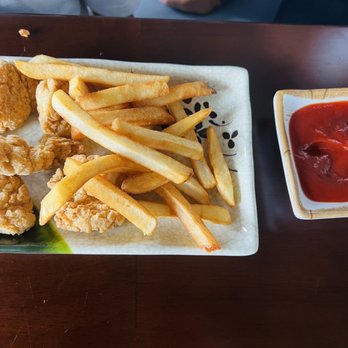 Sakura Bistro - Chicken nuggets with fries - Asian Fusion Near Me - Magnolia, Texas Sakura Bistro - Chicken nuggets with fries - Asian Fusion Near Me - Magnolia, Texas