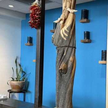 Santo - Santo sculpture of Saint Francis - New Mexican Cuisine Near Me - Boulder, Colorado