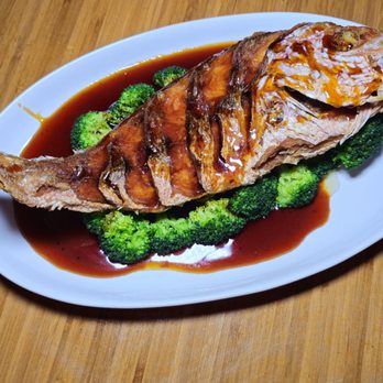 Zabb PuTawn - Crispy Whole Red Snapper with Tamarind Sauce - Thai Near Me - Brooklyn, New York Zabb PuTawn - Crispy Whole Red Snapper with Tamarind Sauce - Thai Near Me - Brooklyn, New York