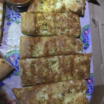 Barro's Pizza - Breadsticks with a side of marinara - Pizza Near Me - Glendale, Arizona Barro's Pizza - Breadsticks with a side of marinara - Pizza Near Me - Glendale, Arizona