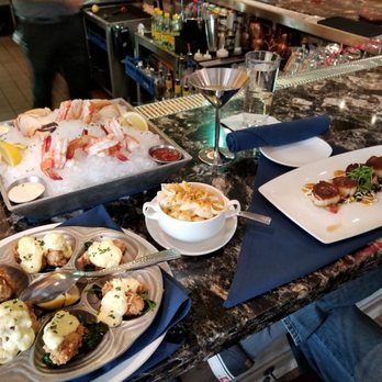 Waters Texas - Bttm left: TX Rockafeller Oysters. Top left: Crab and Jumbo Shrimp. Middle: Lobster man n cheese. Right: Cajun Scallops. - Seafood Near Me - Fort Worth, Texas Waters Texas - Bttm left: TX Rockafeller Oysters. Top left: Crab and Jumbo Shrimp. Middle: Lobster man n cheese. Right: Cajun Scallops. - Seafood Near Me - Fort Worth, Texas
