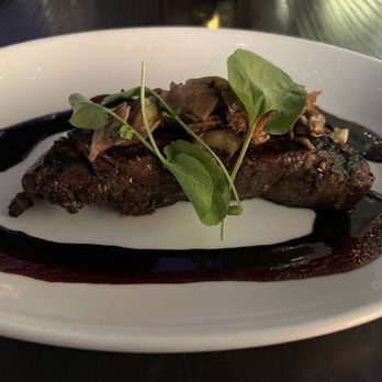 Hell's Kitchen - 14 oz NY Steak cooked medium and was perfect. Mushrooms and sauce excellent. - Cocktail Bars Near Me - Funner, California