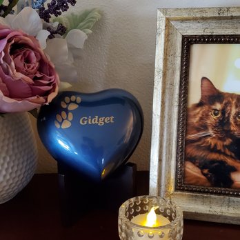 West Coast - Blue heart urn, resting on a stand. - Pet Cremation Services Near Me - Sun Valley, California West Coast - Blue heart urn, resting on a stand. - Pet Cremation Services Near Me - Sun Valley, California