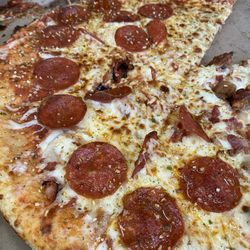 Little Caesars Pizza - Undercooked dough and lacking sauce