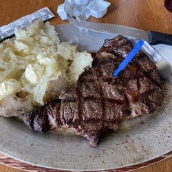 Mainstreet Bar and Grill - Small excellent ribeye (11oz. Isn't really small) and perfectly cooked baked potato.