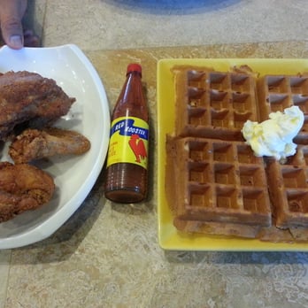 Hidden Cafe - Chicken & Waffles for $10.25 with 6oz red rooster sauce for size reference. LOL :) - New American Near Me - Camarillo, California Hidden Cafe - Chicken & Waffles for $10.25 with 6oz red rooster sauce for size reference. LOL :) - New American Near Me - Camarillo, California