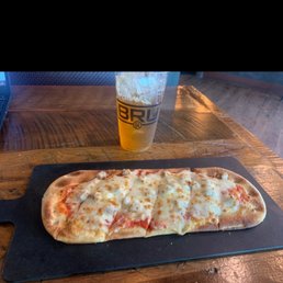 Original Flatbread with sausage and an Iced Green Tea