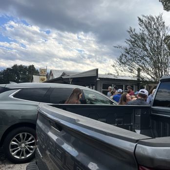 Leona General Store - Line already past the porch at 5:05 pm - Steakhouses Near Me - Leona, Texas