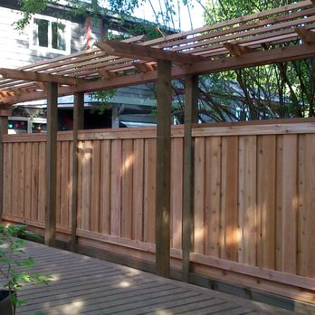 Built To Last Construction - cedar fence with arbor - Fences & Gates Near Me Built To Last Construction - cedar fence with arbor - Fences & Gates Near Me