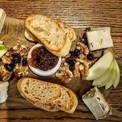 La Belle Epoque Cafe - Plateau de Fromages: Four assorted artisan cheeses complimented with baguette toasts, fig spread, apples, walnuts & dried cranberries. $21