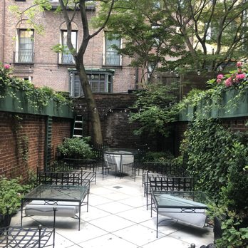 Sosa Irriscape - a courtyard with tables and chairs - Landscaping Near Me Sosa Irriscape - a courtyard with tables and chairs - Landscaping Near Me