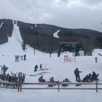 Blackline Tavern - skiers and snowboarders at the bottom of a ski slope - Bars Near Me - Londonderry, Vermont