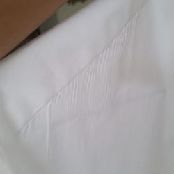 Price Chop Cleaners - Heavy iron wrinkles at the shoulder seam