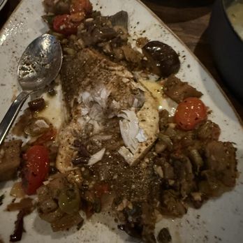 La Fuga - Branzino smothered with puttanesca. - Italian Near Me - Fort Lauderdale, Florida La Fuga - Branzino smothered with puttanesca. - Italian Near Me - Fort Lauderdale, Florida