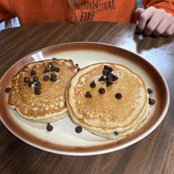 Shelby Bakery - Chocolate Chip Pancakes (Chocolate Milk not pictured) - Bakeries Near Me - Shelby, Michigan Shelby Bakery - Chocolate Chip Pancakes (Chocolate Milk not pictured) - Bakeries Near Me - Shelby, Michigan