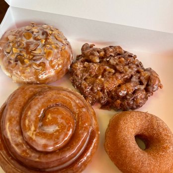 Cronuts Donuts - Donut filled with almond paste & topped with almond slivers, Apple fritter, cinnamon roll, & cinnamon sugar donut - Donuts Near Me - Rogers, Arkansas