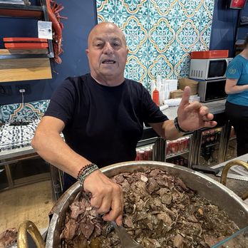Porta Carbone - The cooking pot and our wonderful host! - Sicilian Near Me - Palermo, Pennsylvania
