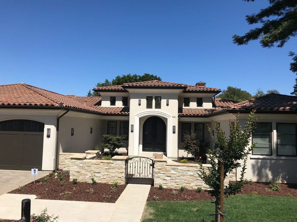 Slide of Exclusively Roofing