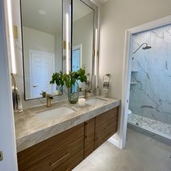 Brighter Life Construction - Full bathroom remodel with a custom floating vanity.