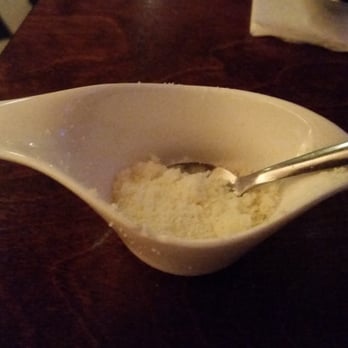 Isola Bella - Table cheese. Did not appear to be fresh grated. Will rempve of proven otherwise. - Italian Near Me - Amsterdam, New Hampshire Isola Bella - Table cheese. Did not appear to be fresh grated. Will rempve of proven otherwise. - Italian Near Me - Amsterdam, New Hampshire