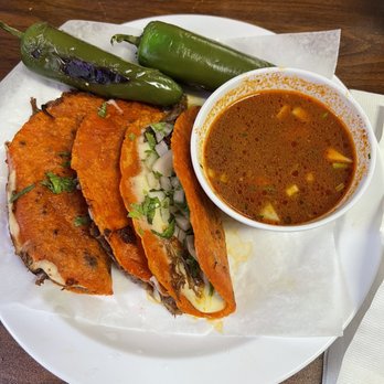 Taqueria El Rey - Quesobirria Tacos, 3, with consumé. Doesn't come with jalapenos. I added them. - Mexican Near Me - Lincoln, Nebraska Taqueria El Rey - Quesobirria Tacos, 3, with consumé. Doesn't come with jalapenos. I added them. - Mexican Near Me - Lincoln, Nebraska
