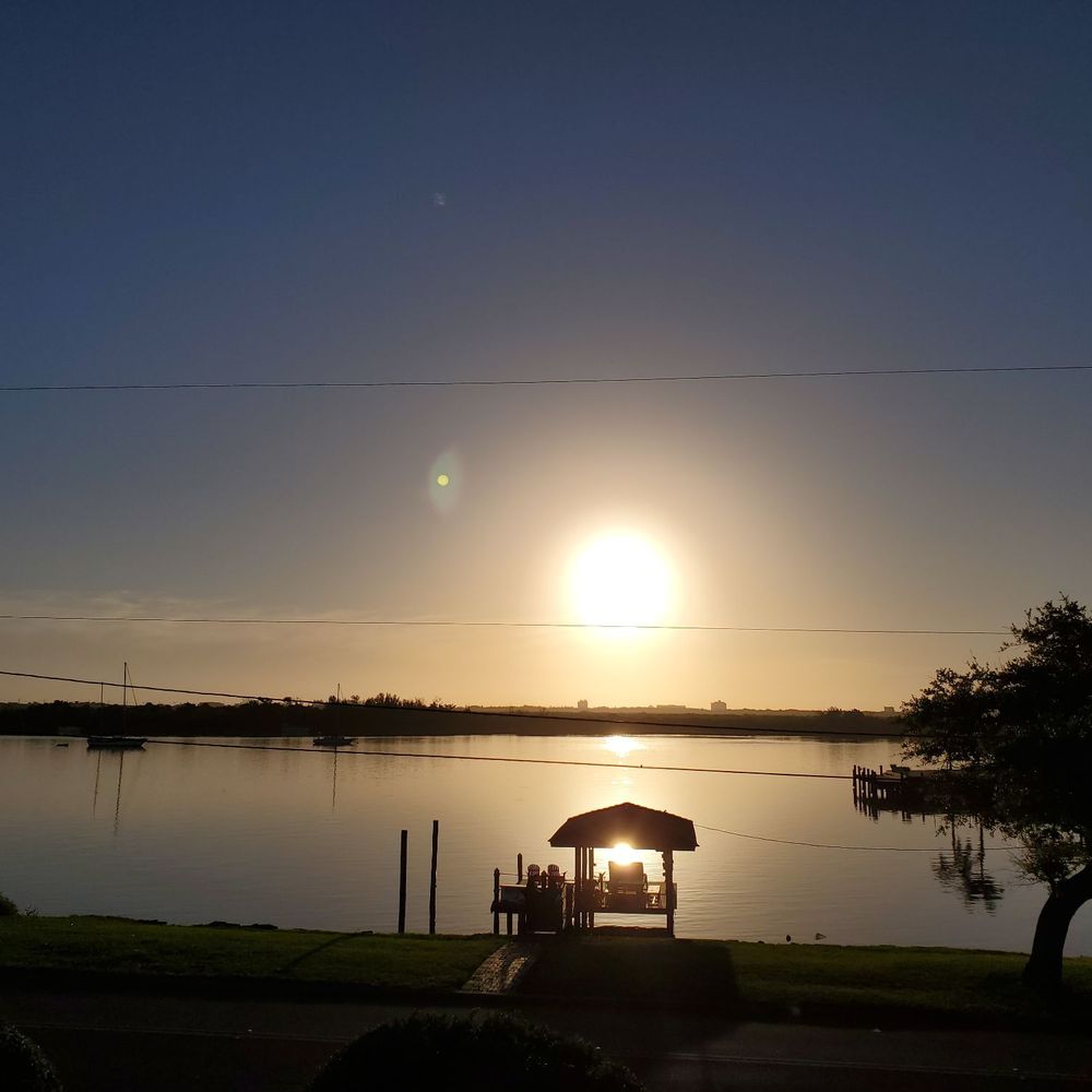 Black Dolphin Inn - Just taking it all in beautiful sunset. - Bed & Breakfast Near Me - New Smyrna Beach, Florida Black Dolphin Inn - Just taking it all in beautiful sunset. - Bed & Breakfast Near Me - New Smyrna Beach, Florida