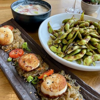 Spice Asian Kitchen - Seared Scallops w/ Vermicelli (left), Tom Kha Soup (top), Edamame (right) - Asian Fusion Near Me - Fort Mill, South Carolina Spice Asian Kitchen - Seared Scallops w/ Vermicelli (left), Tom Kha Soup (top), Edamame (right) - Asian Fusion Near Me - Fort Mill, South Carolina