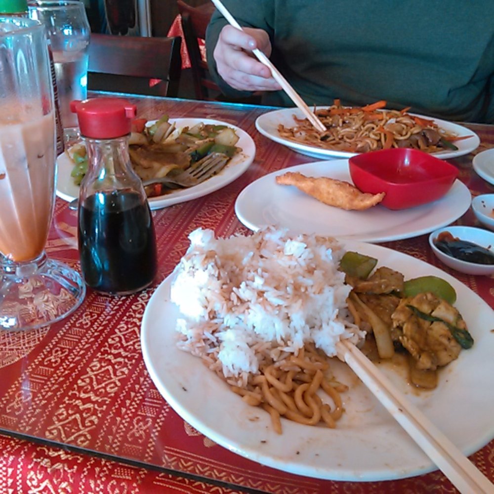 Annie's Cambodian - Lemongrass chicken stir fry on far left, beef chow mein on far end of table, cheese puff in the center. - Cambodian Near Me - Eureka, California Annie's Cambodian - Lemongrass chicken stir fry on far left, beef chow mein on far end of table, cheese puff in the center. - Cambodian Near Me - Eureka, California