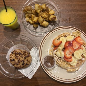 Funk 'n Waffles - Home fries, sausage, waffle with Nutella and banana + strawberries - New American Near Me - Syracuse, New York Funk 'n Waffles - Home fries, sausage, waffle with Nutella and banana + strawberries - New American Near Me - Syracuse, New York