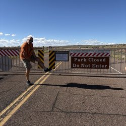 Petrified Forest National Park - Gates closed. Can't see anything. There is one tree stump at the sign...