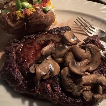 Mike's Place - Ribeye steak with mushrooms and Baked potato - American Near Me - Conway, Arkansas Mike's Place - Ribeye steak with mushrooms and Baked potato - American Near Me - Conway, Arkansas