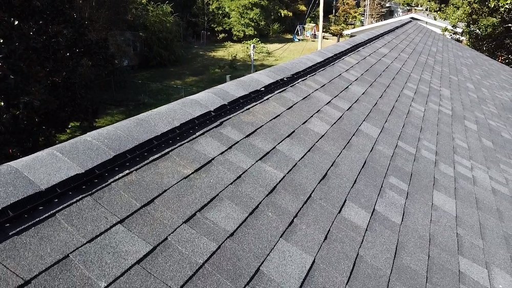 Slide of Quest Roofing & Exteriors