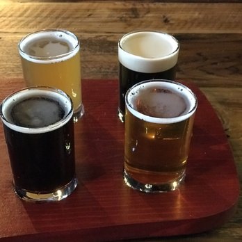 Fat Pants - Clockwise from top left: Orange Belgian, I Love You More chocolate cherry stout, Cream Ale, and Hunney Bear Brown Ale. - Brewpubs Near Me - Eden Prairie, Minnesota