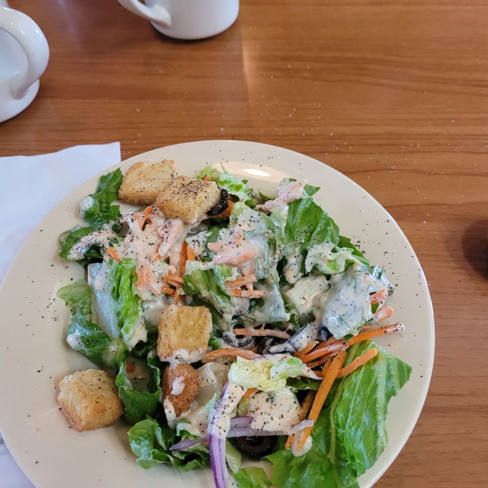 Fresh made salad with creamy parmesan Italian dressing. Fresh made salad with creamy parmesan Italian dressing.