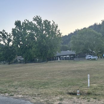 Benbow KOA - Driving into the park... dog park area and part of golf course - Campgrounds Near Me - Garberville, California