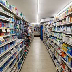 Wellness Pharmacy - Aisles. Toothpaste, dental, toothbrush, sunscreen
