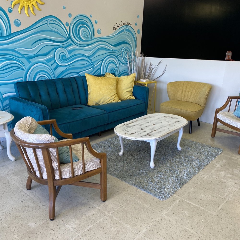 By The Beach Nutrition - a living room with a couch, chairs and a coffee table - Juice Bars & Smoothies Near Me - Myrtle Beach, South Carolina By The Beach Nutrition - a living room with a couch, chairs and a coffee table - Juice Bars & Smoothies Near Me - Myrtle Beach, South Carolina