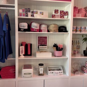 Schatzi's Bakery & Café - Swag wall!  Chats t-shirts, key chains, mugs, caps etc - Bakeries Near Me - Simi Valley, California
