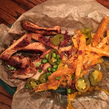 Snuffers - Marinated chicken strips and cheese fries - Burgers Near Me - Addison, Texas Snuffers - Marinated chicken strips and cheese fries - Burgers Near Me - Addison, Texas