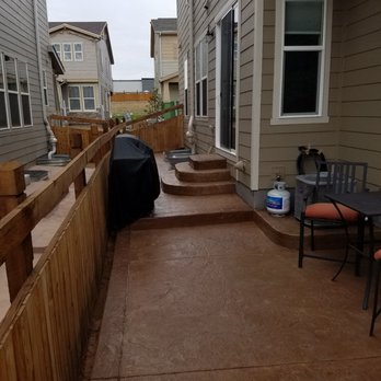 R&T Concrete - a patio with a table and chairs - Masonry/Concrete Near Me - Aurora, Colorado R&T Concrete - a patio with a table and chairs - Masonry/Concrete Near Me - Aurora, Colorado