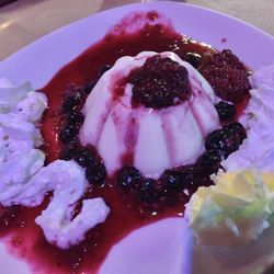 La Taverna dei Quattro Mori - Is this plate blue and gold? Just kidding! Panna cotta with red fruit coulis.