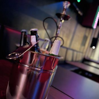 Flare Hookah Lounge - a bottle of wine in a bucket - Hookah Bars Near Me - Oldsmar, Florida