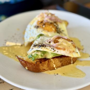 Lava's on Poipu Beach - Avocado eggs Benedict I believe? On top of a sweetbread. Really amazing - New American Near Me - Koloa, Hawaii Lava's on Poipu Beach - Avocado eggs Benedict I believe? On top of a sweetbread. Really amazing - New American Near Me - Koloa, Hawaii