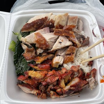 New Duong Son BBQ - 3-item combo with rice and veggies, roast duck (middle), roast pork (top), and honey BBQ pork (bottom). Highly recommend, was only $10.50! - Barbeque Near Me - Westminster, California New Duong Son BBQ - 3-item combo with rice and veggies, roast duck (middle), roast pork (top), and honey BBQ pork (bottom). Highly recommend, was only $10.50! - Barbeque Near Me - Westminster, California