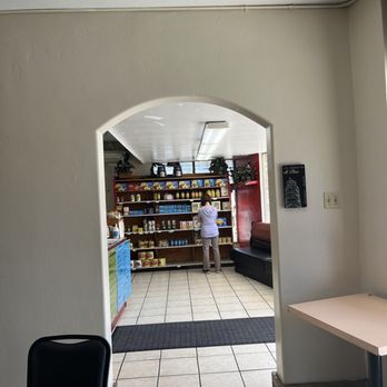 BMH Italian - Seating in here and looking out to the mini market and ordering area - Italian Near Me - La Mesa, California BMH Italian - Seating in here and looking out to the mini market and ordering area - Italian Near Me - La Mesa, California